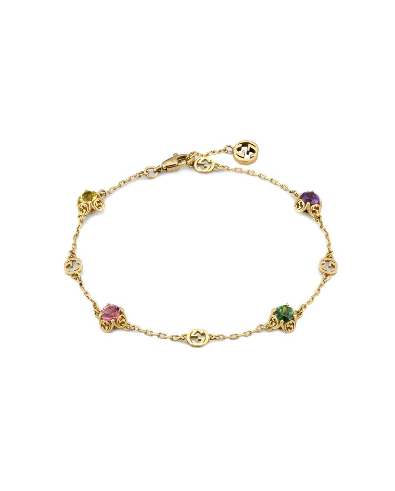 Bracelet entrelacé Gucci en or jaune avec pierres