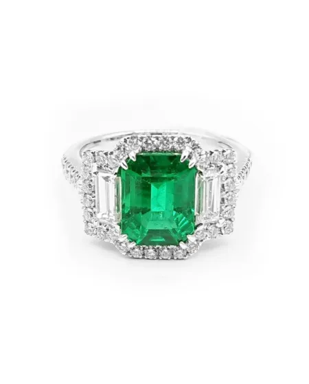 Bague Crivelli en or blanc sertie de diamants et d'une émeraude