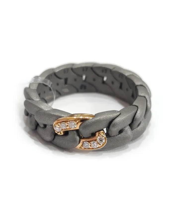 Anteo Elastic Ring in Titanium and Gold with Diamonds