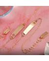 Bracelet Dana Baby en or jaune avec plaque et trèfle à quatre feuilles perforé