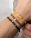Bracciale Concordia Jewellery ABC con Cordino Nero e Lettera "R" in Oro Giallo