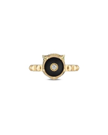 Bague Gucci Le Marché des Merveilles en or jaune, ornée d'onyx noir et de diamants, représentant une tête de félin.