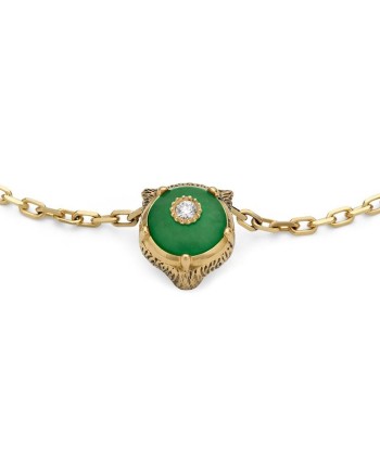 Bracelet Gucci Le Marché des Merveilles en or jaune, jade vert et diamants, orné d'une tête de chat.