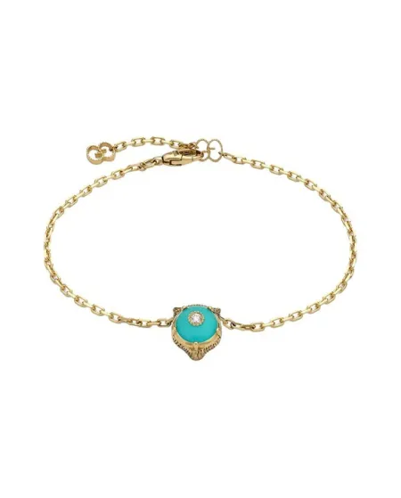 Bracelet Gucci Le Marché des Merveilles en or jaune, orné d'une turquoise et de diamants, avec une tête de chat.