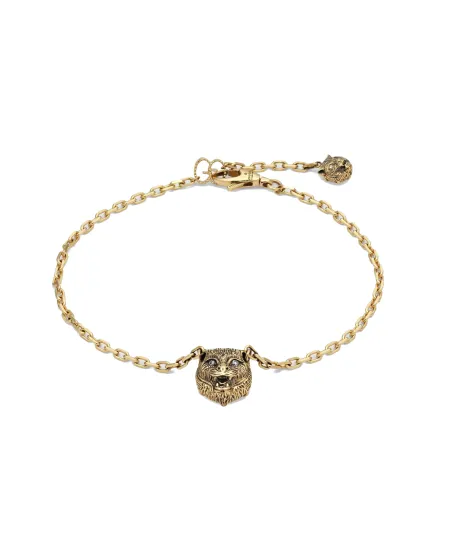 Bracelet Gucci Le Marché des Merveilles en or jaune, orné d'aigue-marine, de tourmaline et de diamants, avec tête de félin.